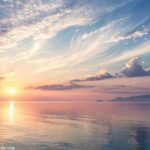 Paisagem tranquila com o sol nascendo sobre o oceano calmo, simbolizando o despertar e o alinhamento espiritual.