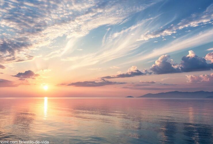 Paisagem tranquila com o sol nascendo sobre o oceano calmo, simbolizando o despertar e o alinhamento espiritual.