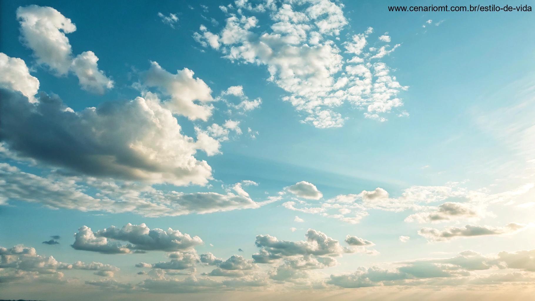 Imagem pacífica e revigorante de um céu claro com algumas nuvens suaves, simbolizando um começo positivo para o dia.