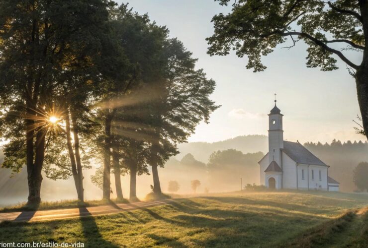 Cena de manhã tranquila com luz suave do sol e uma igreja ao fundo, simbolizando esperança e fé.