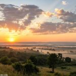 Um lindo amanhecer sobre uma paisagem tranquila com cores suaves e nuvens fofas no céu.
