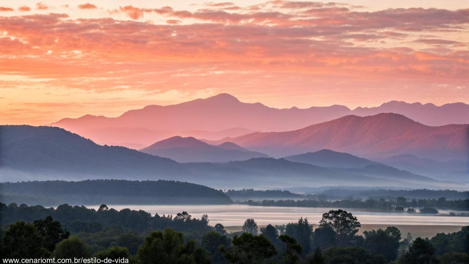 Amanhecer tranquilo sobre uma cadeia de montanhas, com tons suaves de rosa e laranja no céu, refletindo um começo de dia pacífico e cheio de esperança.