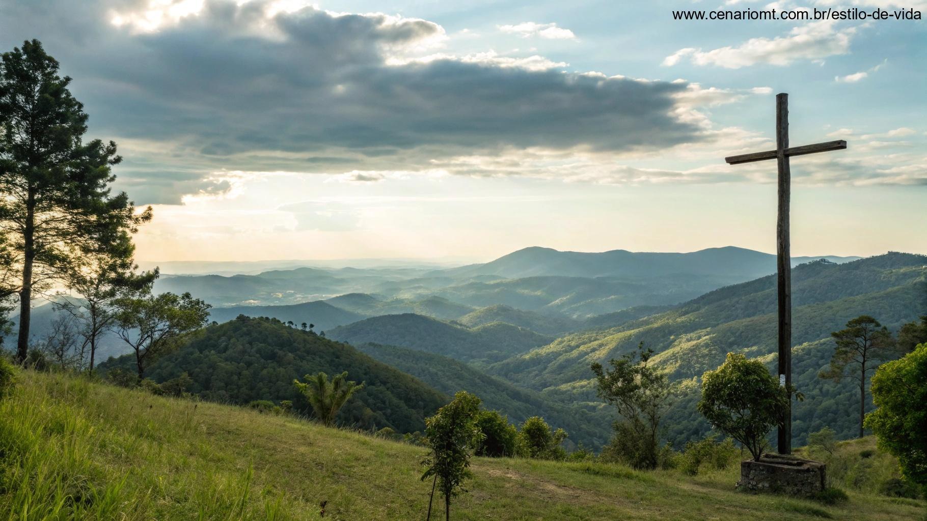 Paisagem tranquila de montanha com uma cruz em primeiro plano, simbolizando a vida e os desafios de São Padre Pio.