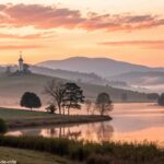 Reflexão sobre a fé com um amanhecer tranquilo e luz suave.