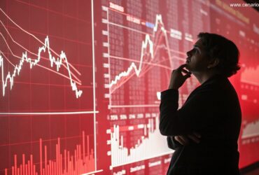 Pessoa pensativa analisando gráficos matemáticos em uma tela futurista com tons de vermelho e branco.