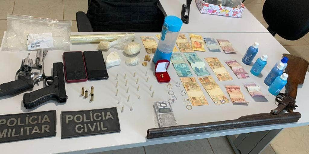 casal e preso em flagrante com armas drogas e dinheiro em colniza