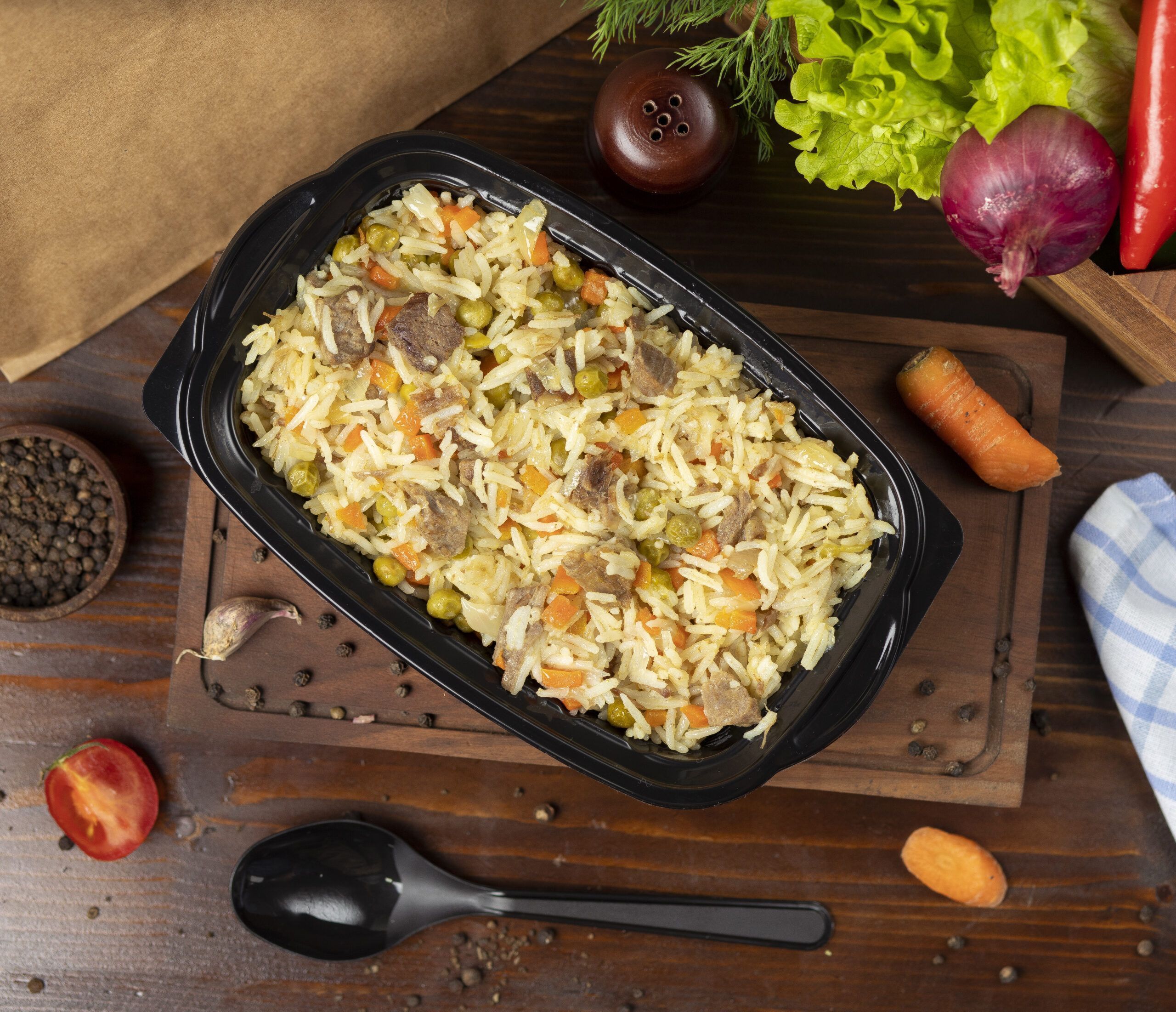 plov rice garnish with vegetables carrots chestnuts and beef pieces scaled