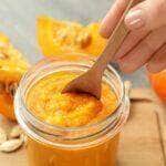 concept of tasty food pumpkin jam close up