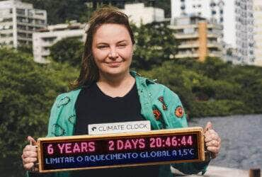 relogio no cristo redentor alerta sobre impactos das mudancas do clima