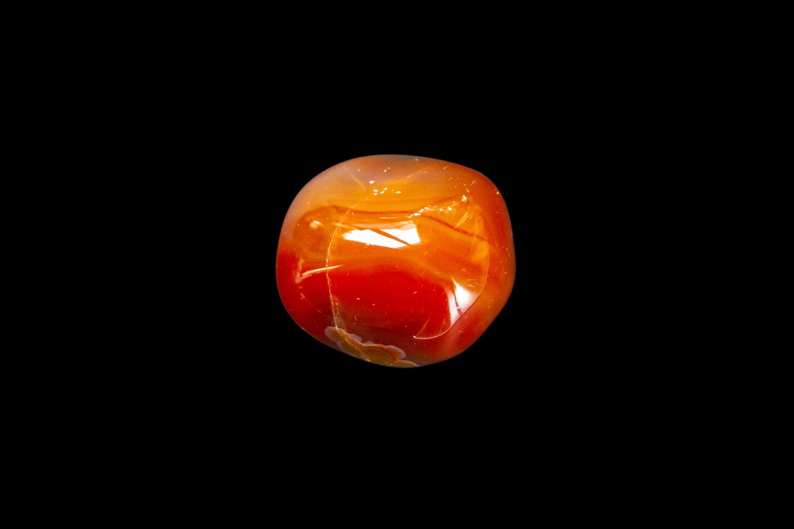 Carnelian Agate Gemstone on a Black Background - Fotos do Canva