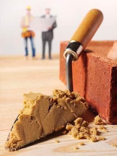 Bricklayer and Cement - Fotos do Canva