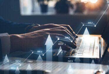 Businessman using laptop for analyzing data stock market. Forex trading graph concept. Trading forex data information. - Fotos do Canva